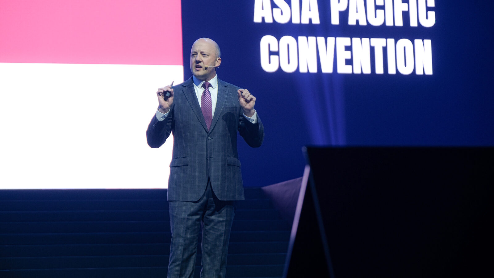 Dr. Reynolds speaking on stage
